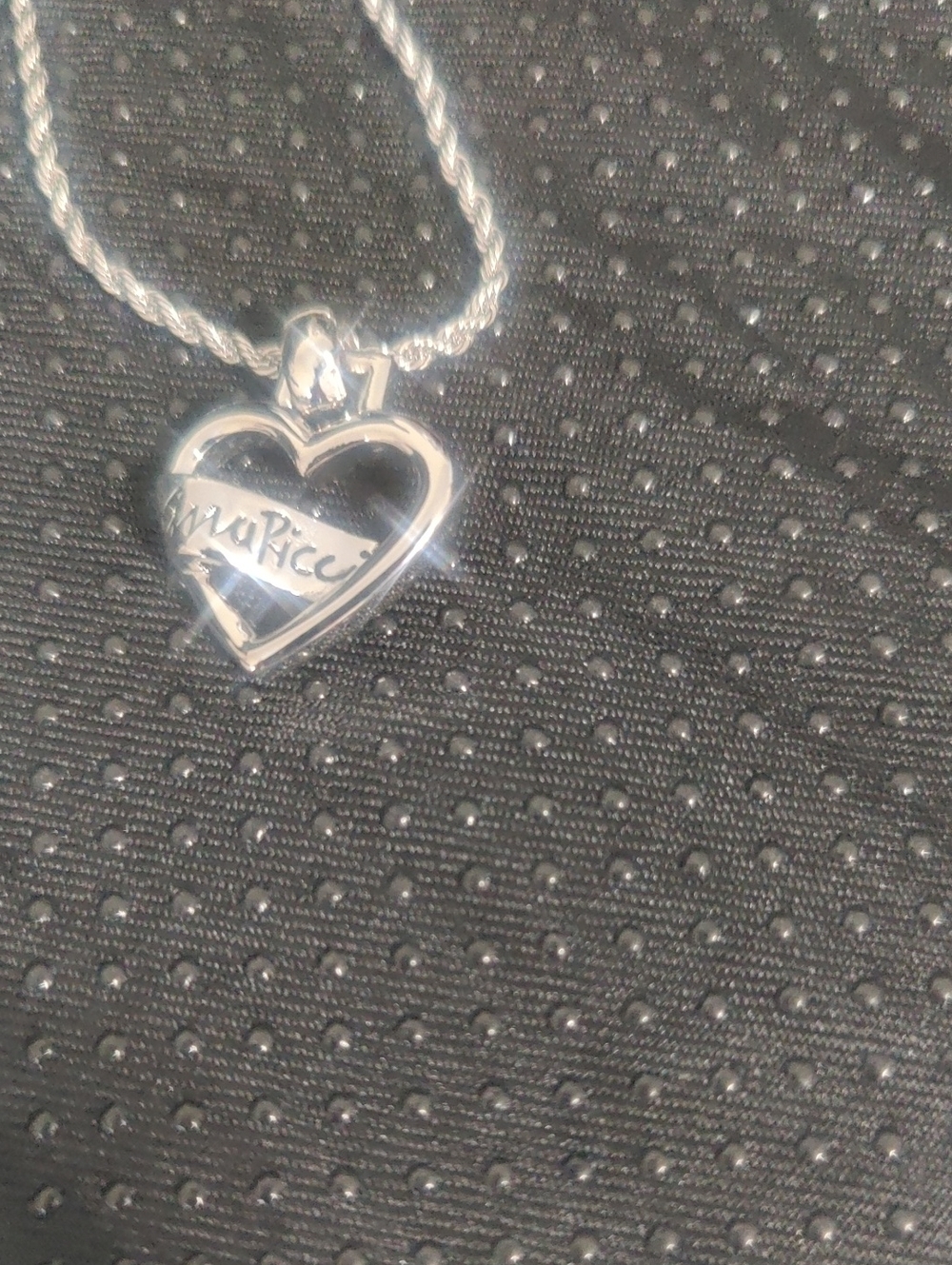 Nina Ricci Silver Heart Pendant Necklace – Sculpted Heart Design